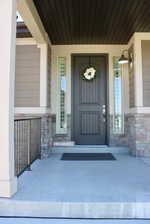 Entrance to property with a porch