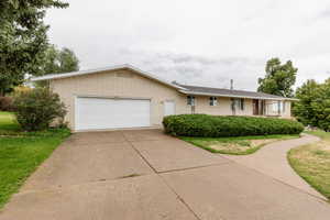 Ranch-style home with a garage