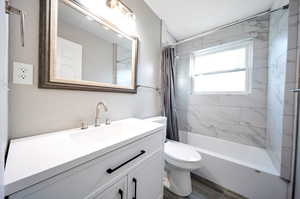 Full bathroom featuring vanity, shower / bathtub combination