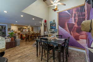 Dining room featuring hardwood / wood-style flooring and ceiling fan