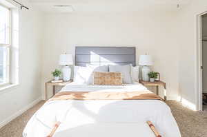 Bedroom featuring carpet flooring