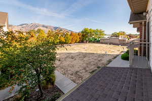 View of yard with a patio area and a mountain view