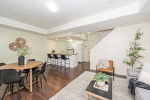 Dining space featuring dark hardwood / wood-style flooring