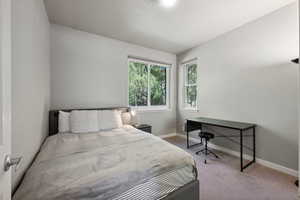 View of carpeted bedroom