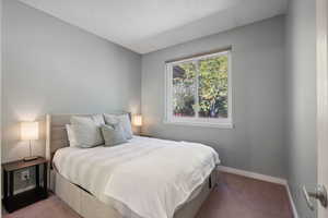 View of carpeted bedroom