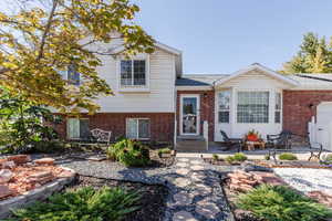 View of front of property featuring a patio