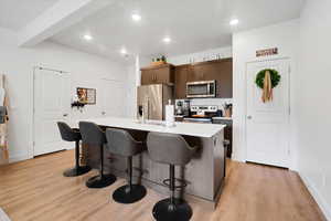 Kitchen with Quartz Countertops and Stainless Steel Appliances