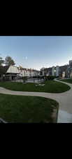 Surrounding community featuring a gazebo and a lawn