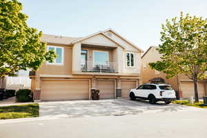 View of front of property with a garage