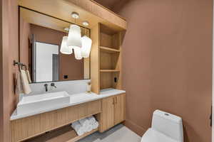 Bathroom with vanity and toilet