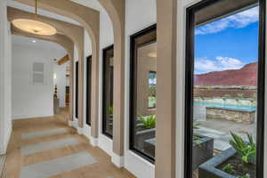 Foyer entrance featuring a mountain view and light hardwood / wood-style floors