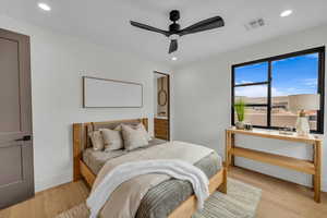 Bedroom featuring ceiling fan and light wood-type flooring