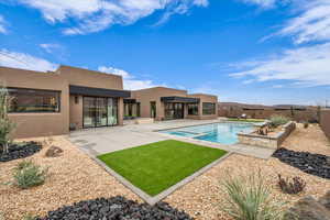 View of swimming pool with a patio