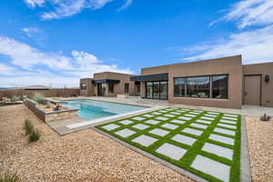 View of pool with a patio area