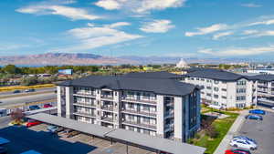 View of building exterior featuring a mountain view