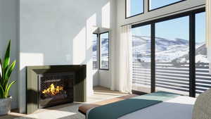 Bedroom featuring a mountain view and light wood-type flooring