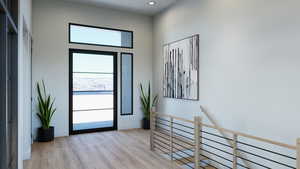 Foyer entrance featuring light hardwood / wood-style floors