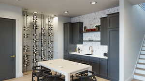 Kitchen featuring light wood-type flooring and sink