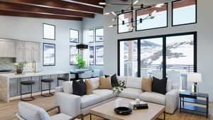 Living room with beamed ceiling, light wood-type flooring, a notable chandelier, and high vaulted ceiling