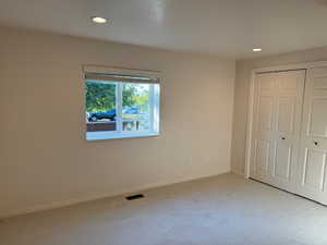 Bedroom with brand new carpet and pad