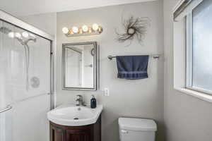 Bathroom with vanity and toilet