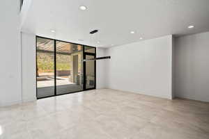 The dining area with expansive windows