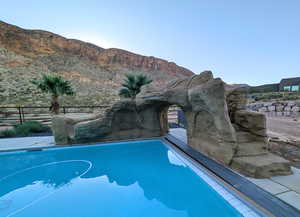 View of swimming pool with a mountain view With waterslide