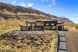 View of front of house featuring a mountain view