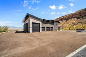 Garage featuring a mountain view