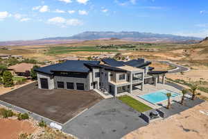 Birds eye view of property with a mountain view