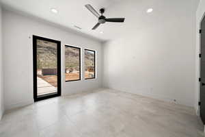 Spare room featuring ceiling fan