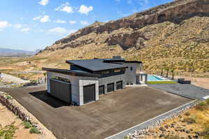 Exterior space with a mountain view.Old photo. House now has a waterslide. Landscape has changed