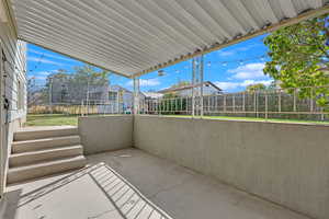 View of patio featuring a trampoline