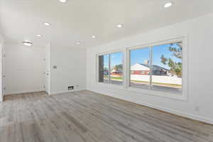 Unfurnished room featuring light hardwood / wood-style flooring