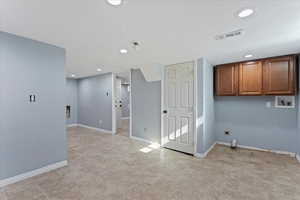 Unfurnished room featuring light tile patterned flooring