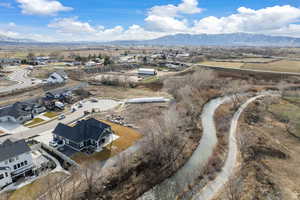 Birds eye view of property featuring a mountain view