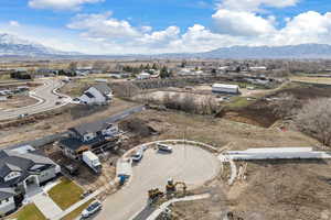 Birds eye view of property with a mountain view