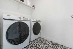 Clothes washing area with washing machine and dryer