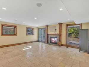 Basement entertaining area with full walkout to the pool and covered patio