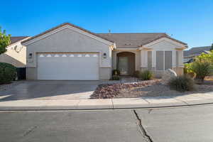 Ranch-style home featuring a garage