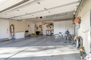 Garage featuring a garage door opener