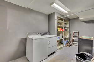 Laundry area featuring separate washer and dryer