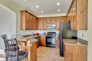 Tall cabinetry and attention to detail give this kitchen functionality and distinct appeal.