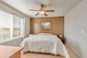 Primary bedroom bathed in natural light.