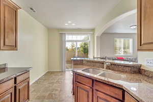 Natural light from the private patio welcomes you to your beautiful kitchen.