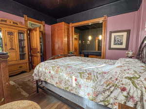 Bedroom featuring hardwood / wood-style flooring