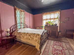 Bedroom featuring hardwood / wood-style flooring