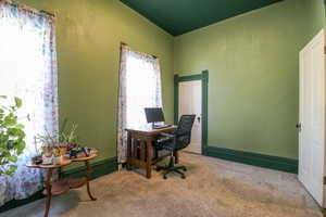 View of carpeted home office