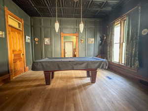 Rec room featuring coffered ceiling, hardwood / wood-style floors, and billiards