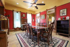 Dining area featuring light hardwood / wood-style flooring and ceiling fan